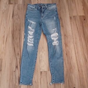 J1 - American Eagle Outfitters Light Blue Distressed Skinny Jeans. Size 4